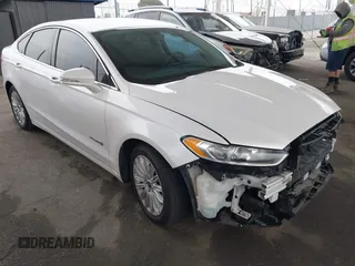 2015 Ford Fusion SE Hybrid with VIN 3FA6P0LUXFR245665, listed as a IAAI auction lot 42561282 with 146,236 mi miles and . Bid and sale history available at DreamBid. Image 1.