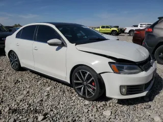 2012 Volkswagen Jetta GLI Autobahn with VIN 3VW5A7AJXCM087214, listed as a Copart auction lot 75011884 with 127,079 mi miles and Salvage title. Bid and sale history available at DreamBid. Image 4.