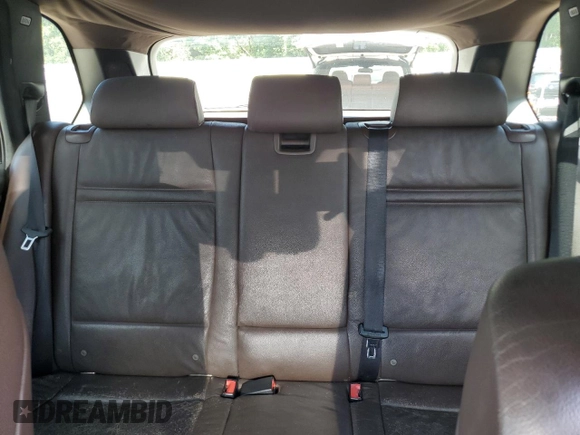 2012 BMW X5 35i with VIN 5UXZV4C54CL744502, listed as a Copart auction lot 57828115 with 161,597 mi miles and Clean title. Bid and sale history available at DreamBid. Image 10.
