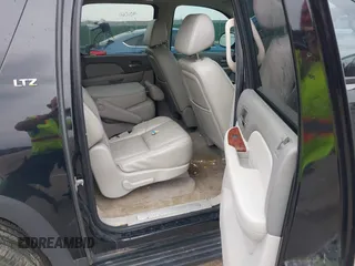 2007 Chevrolet Suburban LT with VIN 3GNFK16307G128456, listed as a IAAI auction lot 42374506 with 161,471 mi miles and . Bid and sale history available at DreamBid. Image 8.