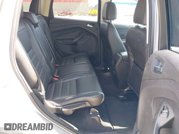 2017 Ford Escape Titanium with VIN 1FMCU9JD3HUE03686, listed as a IAAI auction lot 42016950 with 82,299 mi miles. Bid and sale history available at carsss.com. Image 8.