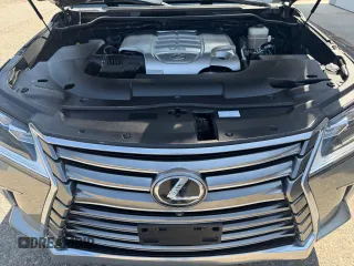 2017 Lexus LX 570 z VIN JTJHY7AX7H4244407, wystawiony jako Copart lot #56943755 z przebiegiem 105 207 mil mil oraz Czysty tytuł • Clean title. Historia ofert i sprzedaży dostępna na DreamBid. Obrazek 7.