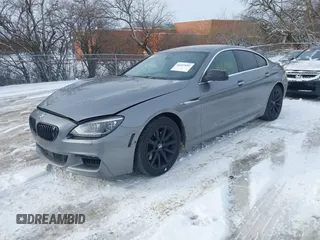 2013 BMW 6 Series 650i xDrive with VIN WBA6B4C54DDG67543, listed as a IAAI auction lot 41607681 with 74,101 mi miles. Bid and sale history available at carsss.com. Image 2.