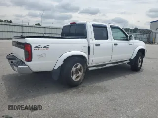 2000 Nissan Frontier XE with VIN 1N6ED27Y6YC334154, listed as a Copart auction lot 54140454 with 330,552 mi miles and Salvage title. Bid and sale history available at DreamBid. Image 3.