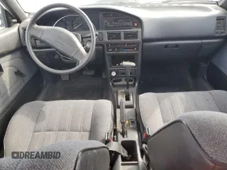 1990 Toyota Corolla z VIN 1NXAE94A0LZ089770, wystawiony jako Copart lot #75318334 z przebiegiem 161 894 mil mil oraz Szkoda całkowita • Salvage title. Historia ofert i sprzedaży dostępna na DreamBid. Obrazek 8.
