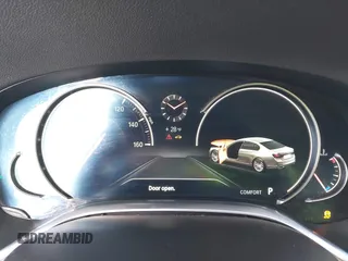 2018 BMW 7 Series 740i with VIN WBA7E2C50JG742505, listed as a IAAI auction lot 41238238 with 111,901 mi miles. Bid and sale history available at carsss.com. Image 7.
