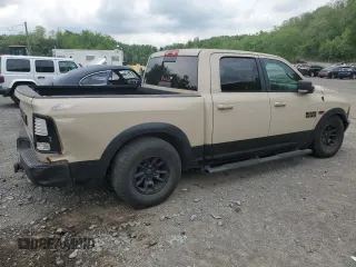2017 Ram 1500 Rebel z VIN 1C6RR7YT0HS611836, wystawiony jako Copart lot #56943955 z przebiegiem 55 548 mil mil oraz Szkoda całkowita • Salvage title. Historia ofert i sprzedaży dostępna na DreamBid. Obrazek 3.