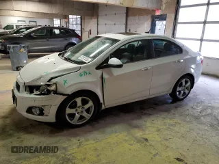 2012 Chevrolet Sonic LTZ z VIN 1G1JE5SH9C4143735, wystawiony jako Copart lot #47083355 z przebiegiem 109 585 mil mil oraz Szkoda całkowita • Salvage title. Historia ofert i sprzedaży dostępna na DreamBid. Obrazek 1.