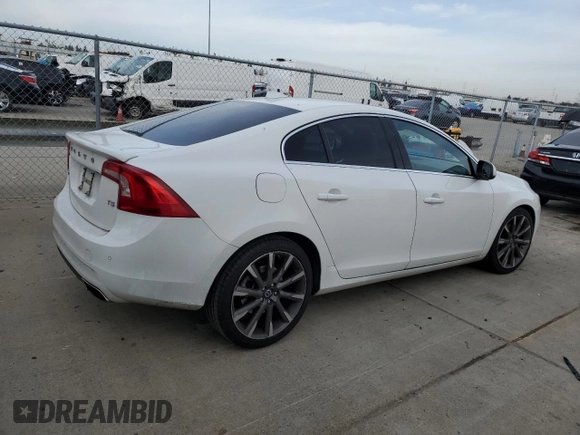 2015 Volvo S60 T5 Drive-E Platinum with VIN YV140MFD7F2301858, listed as a Copart auction lot 44586105 with 50,575 mi miles and Salvage Title. Bid and sale history available at carsss.com. Image 3.
