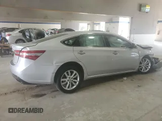 2013 Toyota Avalon XLE with VIN 4T1BK1EB0DU001291, listed as a Copart auction lot 54129175 with 107,242 mi miles and Salvage Title. Bid and sale history available at DreamBid. Image 3.