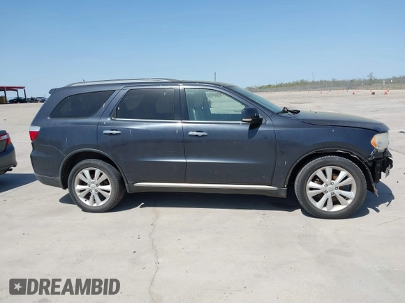 2013 Dodge Durango Crew with VIN 1C4SDHDT5DC637535, listed as a IAAI auction lot 41867982 with 162,569 mi miles and . Bid and sale history available at DreamBid. Image 13.