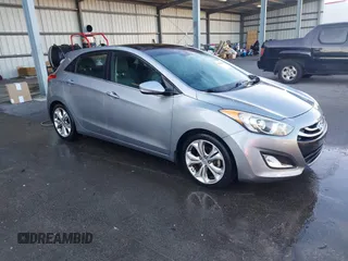 2014 Hyundai Elantra GT with VIN KMHD35LH1EU162934, listed as a IAAI auction lot 41705866 with 121,709 mi miles. Bid and sale history available at carsss.com. Image 1.