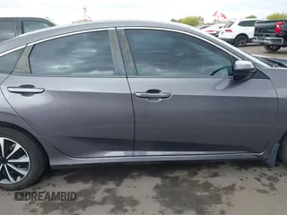 2017 Honda Civic LX with VIN 19XFC2F50HE055888, listed as a IAAI auction lot 42202494 with 147,354 mi miles and . Bid and sale history available at DreamBid. Image 13.