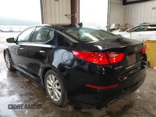 2014 Kia Optima EX z VIN 5XXGN4A75EG339104, wystawiony jako IAAI lot #42311979 z przebiegiem 115 119 mil mil oraz . Historia ofert i sprzedaży dostępna na DreamBid. Obrazek 3.