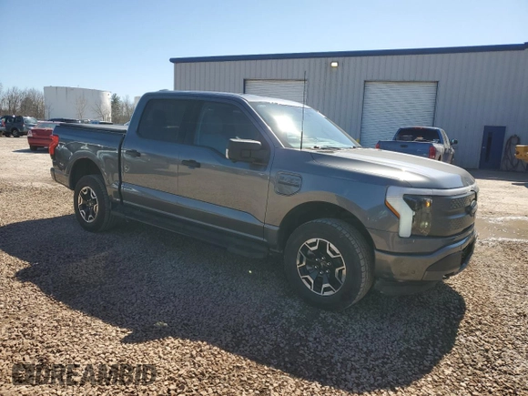 2023 Ford F-150 Lightning Pro z VIN 1FTVW1EL8PWG10894, wystawiony jako Copart lot #50988655 z przebiegiem 34 020 mil mil oraz Szkody całkowita. Historia ofert i sprzedaży dostępna na DreamBid. Obrazek 4.