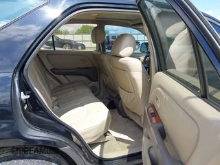 2000 Lexus RX 300 with VIN JT6HF10U9Y0126788, listed as a IAAI auction lot 42190888 with 204,747 mi miles. Bid and sale history available at carsss.com. Image 8.