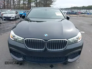 2019 BMW 7 Series 740i with VIN WBA7E2C57KB217973, listed as a IAAI auction lot 39064321 with 54,818 mi miles and . Bid and sale history available at DreamBid. Image 12.