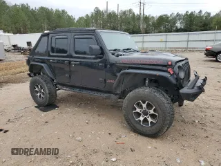 2021 Jeep Wrangler Unlimited Rubicon with VIN 1C4JJXFM0MW627692, listed as a Copart auction lot 43525105 with 102,472 mi miles and Salvage Title. Bid and sale history available at carsss.com. Image 4.