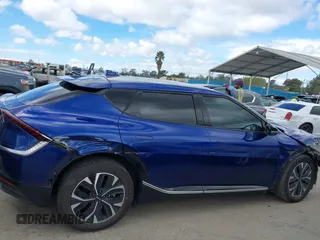 2022 Kia EV6 Wind with VIN KNDC34LA2N5049730, listed as a IAAI auction lot 41793235 with 109,806 mi miles and . Bid and sale history available at DreamBid. Image 14.