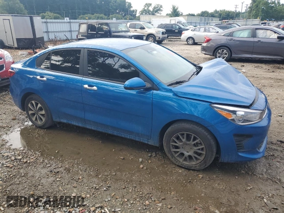 2023 Kia Rio S with VIN 3KPA24AD6PE548027, listed as a Copart auction lot 63697104 with 34,588 mi miles and Salvage Title. Bid and sale history available at carsss.com. Image 4.