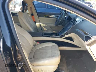 2014 Lincoln MKZ z VIN 3LN6L2G91ER821841, wystawiony jako IAAI lot #42655383 z przebiegiem Nie podano mil oraz . Historia ofert i sprzedaży dostępna na DreamBid. Obrazek 5.