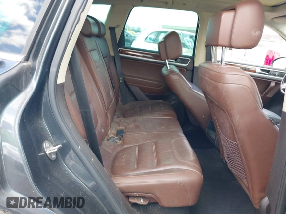 2013 Volkswagen Touareg Lux with VIN WVGEF9BP4DD006851, listed as a IAAI auction lot 41983791 with 115,551 mi miles and . Bid and sale history available at DreamBid. Image 8.