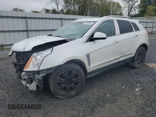 2012 Cadillac SRX Luxury Collection z VIN 3GYFNAE32CS591556, wystawiony jako Copart lot #50870825 z przebiegiem 157 414 mil mil oraz Szkody całkowita. Historia ofert i sprzedaży dostępna na DreamBid. Obrazek 1.