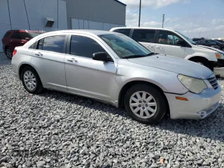 2010 Chrysler Sebring Touring with VIN 1C3CC4FB1AN222348, listed as a Copart auction lot 53973945 with 175,972 mi miles and Salvage Title. Bid and sale history available at DreamBid. Image 4.