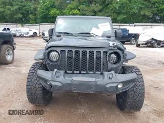 2021 Jeep Gladiator Sport S with VIN 1C6JJTAM7ML554412, listed as a IAAI auction lot 42199167 with 74,263 mi miles and . Bid and sale history available at DreamBid. Image 12.