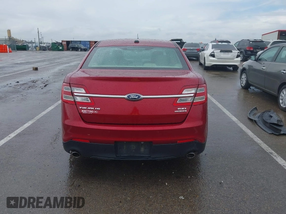 2014 Ford Taurus SEL z VIN 1FAHP2E83EG125622, wystawiony jako IAAI lot #42204238 z przebiegiem 134 032 mil mil oraz . Historia ofert i sprzedaży dostępna na DreamBid. Obrazek 17.