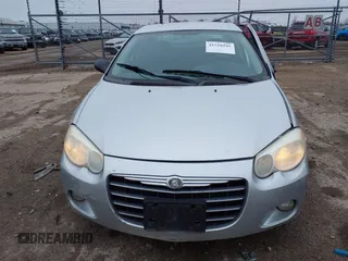 2004 Chrysler Sebring Touring z VIN 1C3EL56R74N392214, wystawiony jako IAAI lot #41510245 z przebiegiem 159 751 mil mil oraz . Historia ofert i sprzedaży dostępna na DreamBid. Obrazek 12.