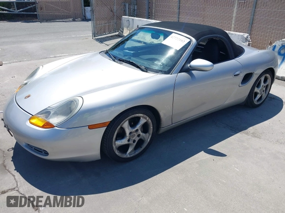 1999 Porsche Boxster with VIN WP0CA2984XU624983, listed as a IAAI auction lot 42722102 with 100,889 mi miles and . Bid and sale history available at DreamBid. Image 2.