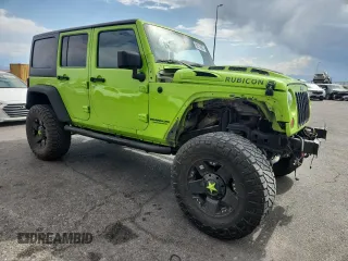 2012 Jeep Wrangler Unlimited Call of Duty MW3 z VIN 1C4BJWFG4CL242211, wystawiony jako Copart lot #59774555 z przebiegiem 117 463 mil mil oraz Szkoda całkowita • Salvage title. Historia ofert i sprzedaży dostępna na DreamBid. Obrazek 4.