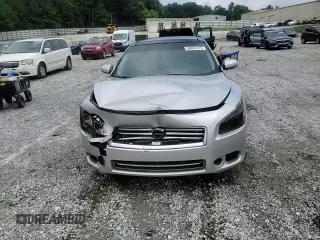 2012 Nissan Maxima SV с VIN 1N4AA5AP8CC864734, выставлен на аукционе Copart как лот 58805175 с пробегом 165 192 миль миль и Списание • Salvage title. История ставок и продаж доступна на DreamBid. Изображение 13.