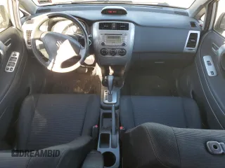 2006 Suzuki Aerio Premium z VIN JS2RC62H965350085, wystawiony jako Copart lot #80517544 z przebiegiem 32 434 mil mil oraz Szkody całkowita. Historia ofert i sprzedaży dostępna na DreamBid. Obrazek 8.