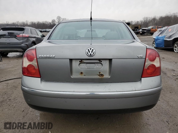 2003 Volkswagen Passat GLX z VIN WVWRH63B53P198926, wystawiony jako Copart lot #46875345 z przebiegiem 185 075 mil mil oraz Szkoda całkowita • Salvage title. Historia ofert i sprzedaży dostępna na DreamBid. Obrazek 6.