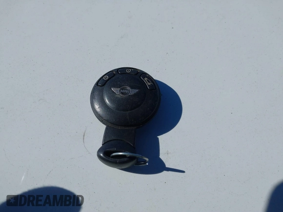 2009 MINI Hardtop S with VIN WMWMF73589TT95974, listed as a IAAI auction lot 41617775 with Not provided miles and . Bid and sale history available at DreamBid. Image 11.