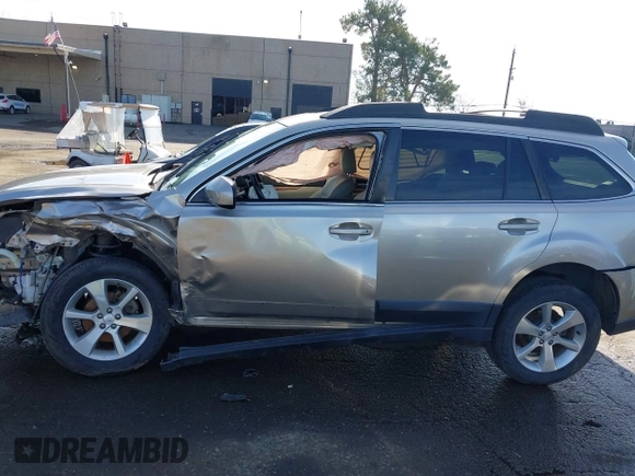 2014 Subaru Outback Limited with VIN 4S4BRBLC7E3325536, listed as a IAAI auction lot 41209727 with 128,758 mi miles and . Bid and sale history available at DreamBid. Image 14.