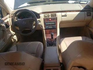2001 Mercedes-Benz E-Class AWD with VIN WDBJH82J91X057063, listed as a Copart auction lot 70235274 with 174,846 mi miles and Salvage Title. Bid and sale history available at carsss.com. Image 8.