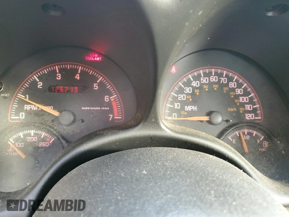 2001 Pontiac Grand Am SE z VIN 1G2NE52T91M583582, wystawiony jako Copart lot #77808974 z przebiegiem 126 219 mil mil oraz Szkoda całkowita • Salvage title. Historia ofert i sprzedaży dostępna na DreamBid. Obrazek 9.