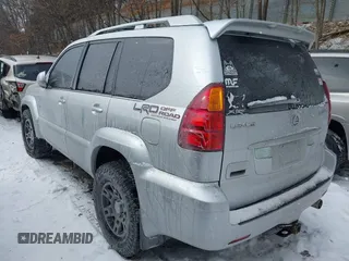 2006 Lexus GX with VIN JTJBT20X660121517, listed as a IAAI auction lot 41629022 with 256,760 mi miles. Bid and sale history available at carsss.com. Image 3.