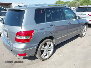 2012 Mercedes-Benz GLK GLK 350 with VIN WDCGG5GB5CF777865, listed as a IAAI auction lot 41882324 with 133,385 mi miles. Bid and sale history available at carsss.com. Image 4.