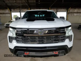 2023 Chevrolet Silverado 1500 LT Trail Boss with VIN 3GCUDFE88PG231046, listed as a Copart auction lot 87631285 with 50,893 mi miles and Salvage Title. Bid and sale history available at DreamBid. Image 5.