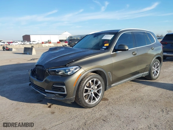 2023 BMW X5 sDrive40i with VIN 5UXCR4C02P9S02333, listed as a IAAI auction lot 41219318 with 32,966 mi miles. Bid and sale history available at carsss.com. Image 2.