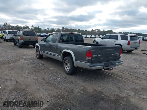 2003 Dodge Dakota SLT with VIN 1D7HL42N63S100130, listed as a IAAI auction lot 41419945 with 185,326 mi miles. Bid and sale history available at carsss.com. Image 3.
