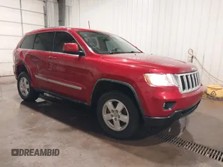 2011 Jeep Grand Cherokee Laredo z VIN 1J4RR4GG5BC540012, wystawiony jako IAAI lot #41978007 z przebiegiem 176 766 mil mil oraz . Historia ofert i sprzedaży dostępna na DreamBid. Obrazek 1.