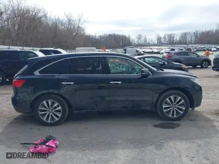2016 Acura MDX w/Tech with VIN 5FRYD4H40GB057055, listed as a IAAI auction lot 41829747 with 140,890 mi miles. Bid and sale history available at carsss.com. Image 13.