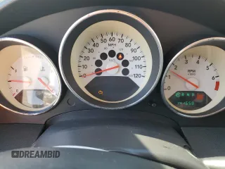 2009 Dodge Caliber SXT z VIN 1B3HB48A19D199410, wystawiony jako Copart lot #55133965 z przebiegiem 141 658 mil mil oraz Szkoda całkowita • Salvage title. Historia ofert i sprzedaży dostępna na DreamBid. Obrazek 9.