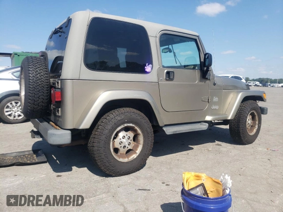 2003 Jeep Wrangler Sahara with VIN 1J4FA59S23P303845, listed as a Copart auction lot 68101244 with 141,753 mi miles and Clean Title. Bid and sale history available at carsss.com. Image 3.