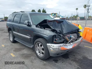 2003 GMC Yukon SLT with VIN 1GKEC13V83R308631, listed as a IAAI auction lot 41773626 with 244,719 mi miles. Bid and sale history available at carsss.com. Image 1.